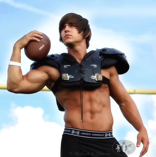 male model with rugby ball